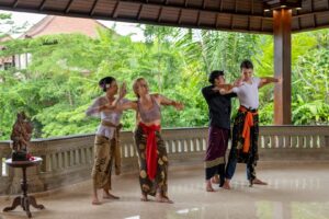 two man and two women practicing Balinese traditional dance